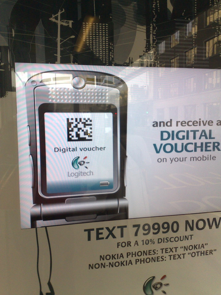 Digital billboard with a DataMatrix code on it.