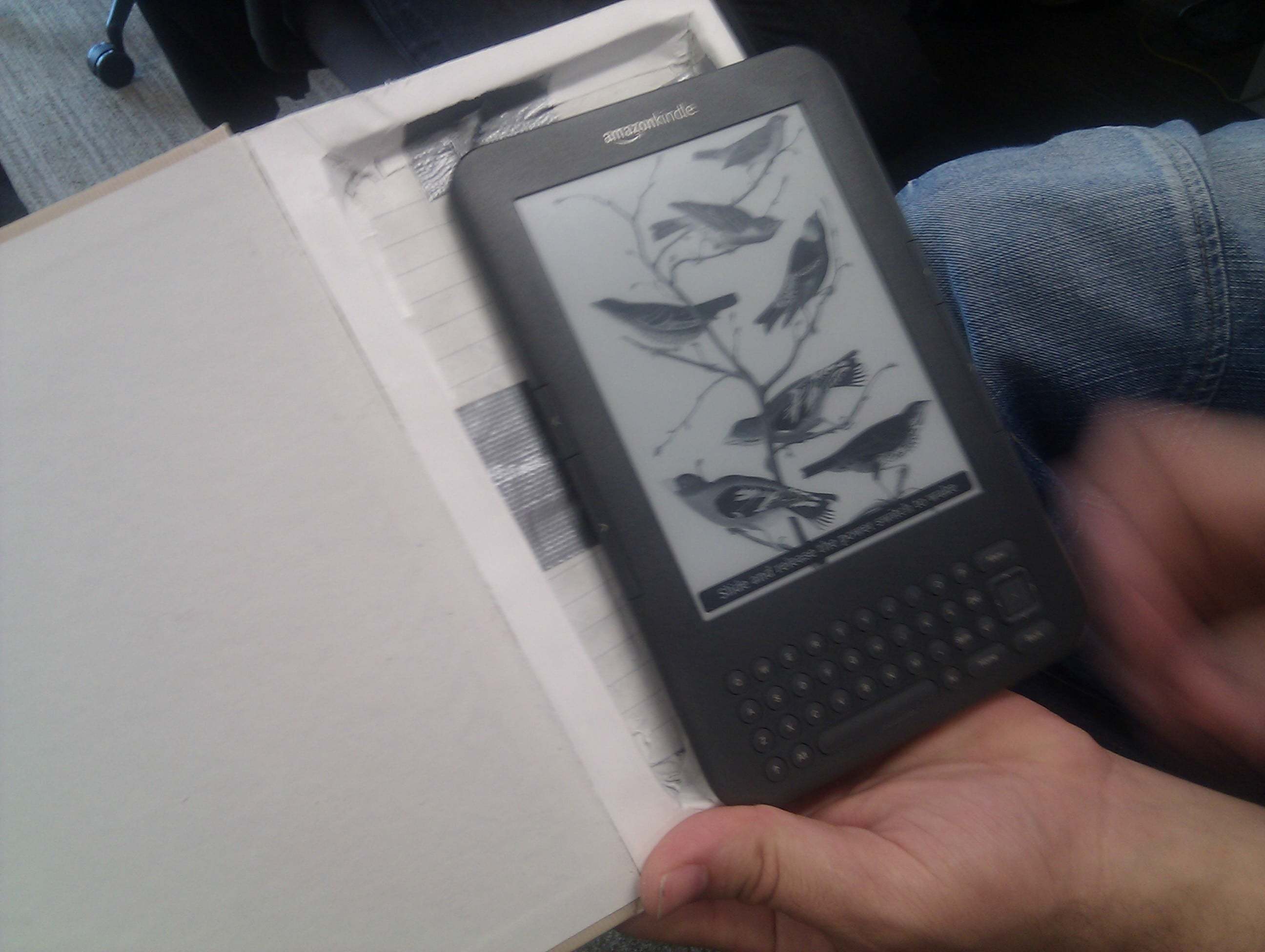 A Kindle hidden in a hollowed out paper book.
