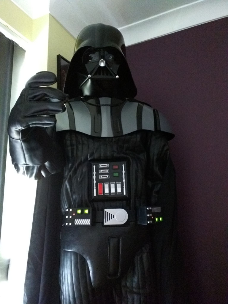 A huge, life size Darth Vader dominates the room.
