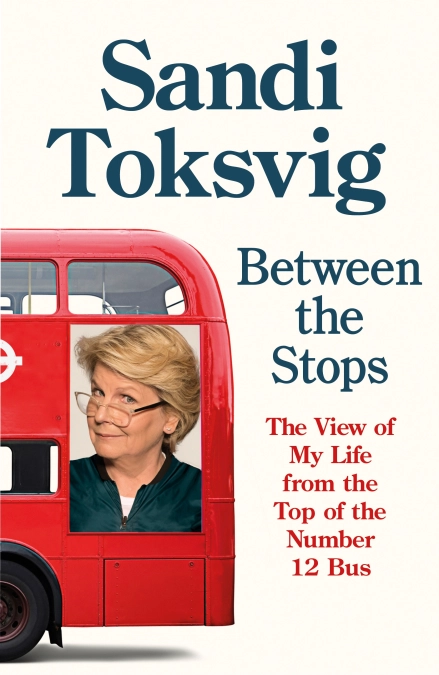 The comedian Sandi Toksvig looks out of the window of a bus.