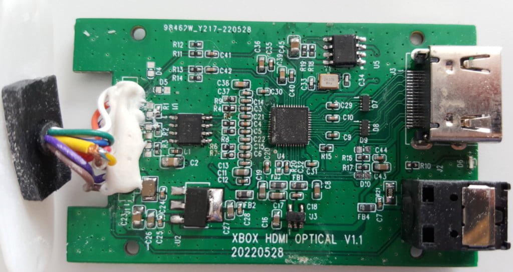 A circuit board embossed with 98462W_Y217-220528.