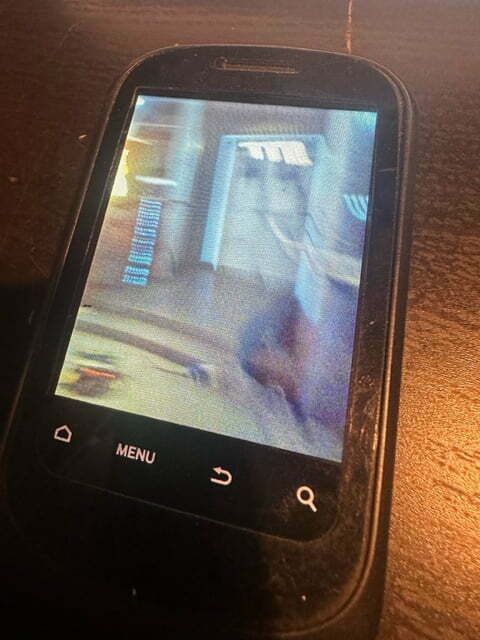 Photo of a phone showing a photo of the Interior of the TARDIS.