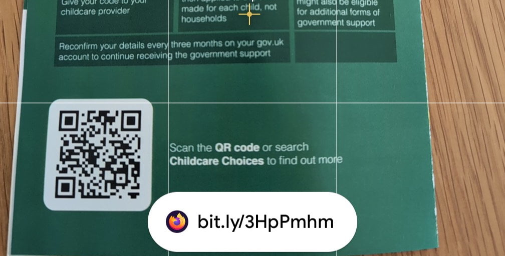 A leaflet for Childcare with a prominent QR code.